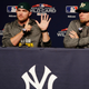 Liam Hendriks and Blake Treinen. Hendriks is possibly attempting to count how many different pitchers the A’s will use over the first six innings.